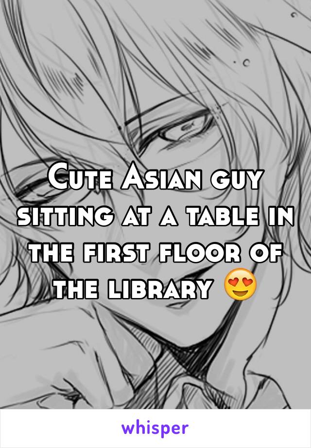 Cute Asian guy sitting at a table in the first floor of the library 😍