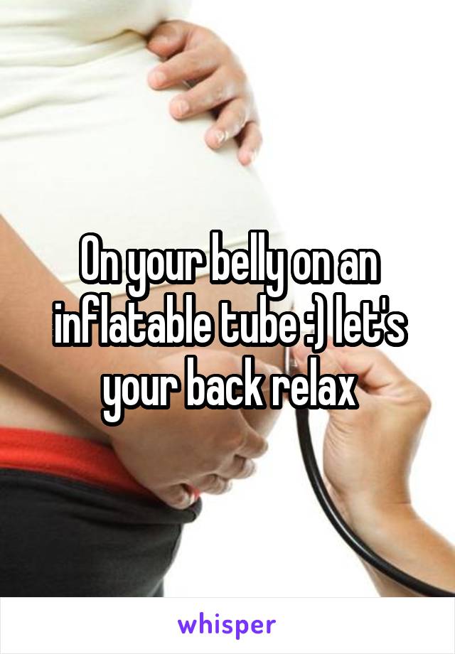 On your belly on an inflatable tube :) let's your back relax