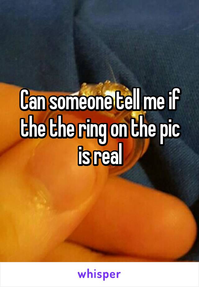 Can someone tell me if the the ring on the pic is real
