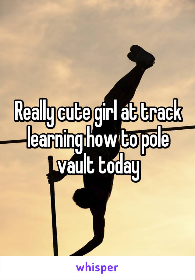 Really cute girl at track learning how to pole vault today