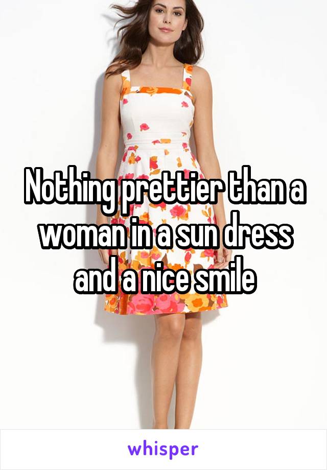 Nothing prettier than a woman in a sun dress and a nice smile