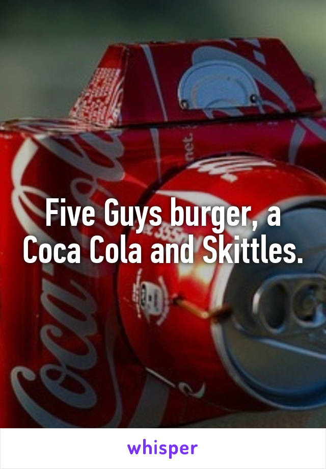Five Guys burger, a Coca Cola and Skittles.
