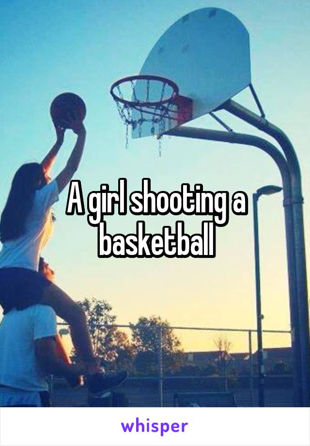 A girl shooting a basketball