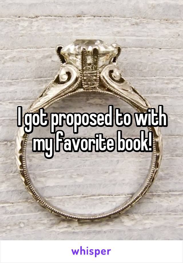 I got proposed to with my favorite book!