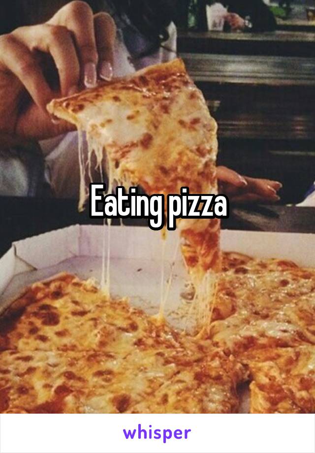 Eating pizza
