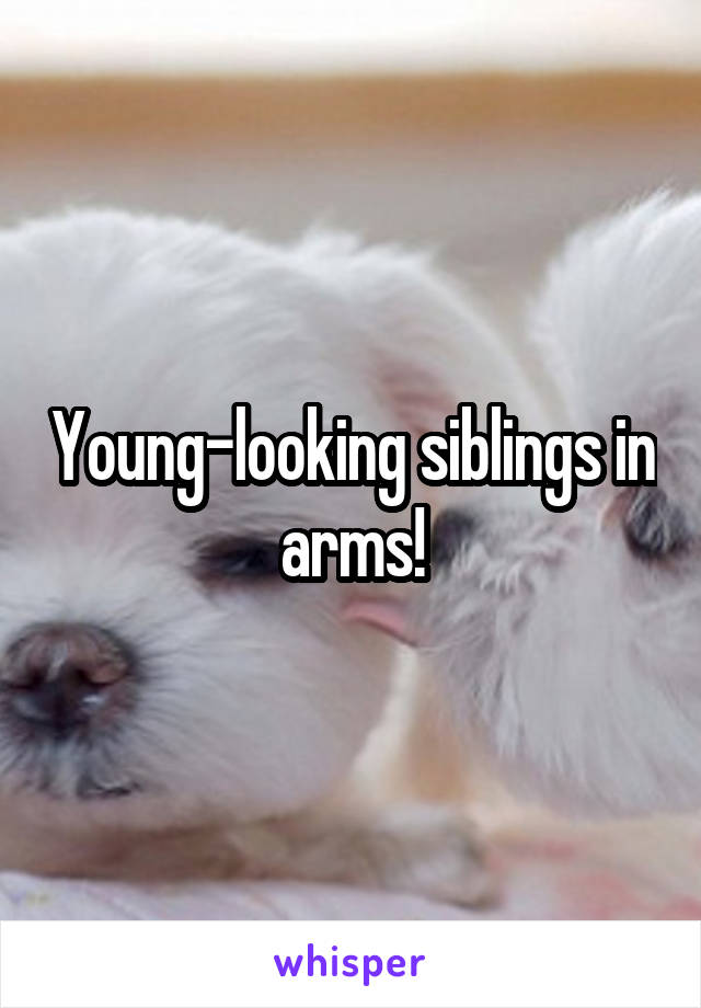 Young-looking siblings in arms!