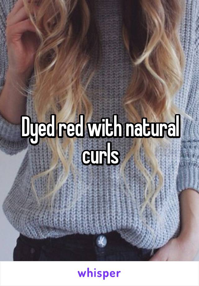 Dyed red with natural curls