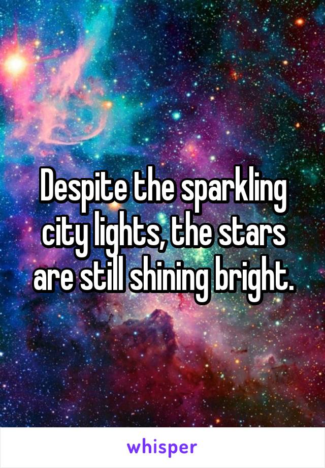 Despite the sparkling city lights, the stars are still shining bright.