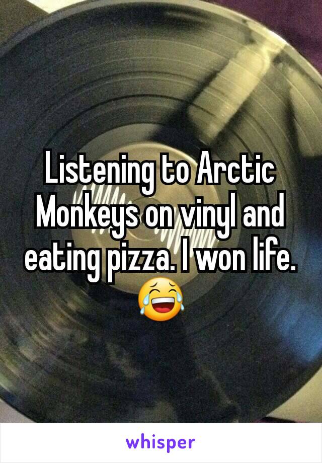 Listening to Arctic Monkeys on vinyl and eating pizza. I won life. 😂
