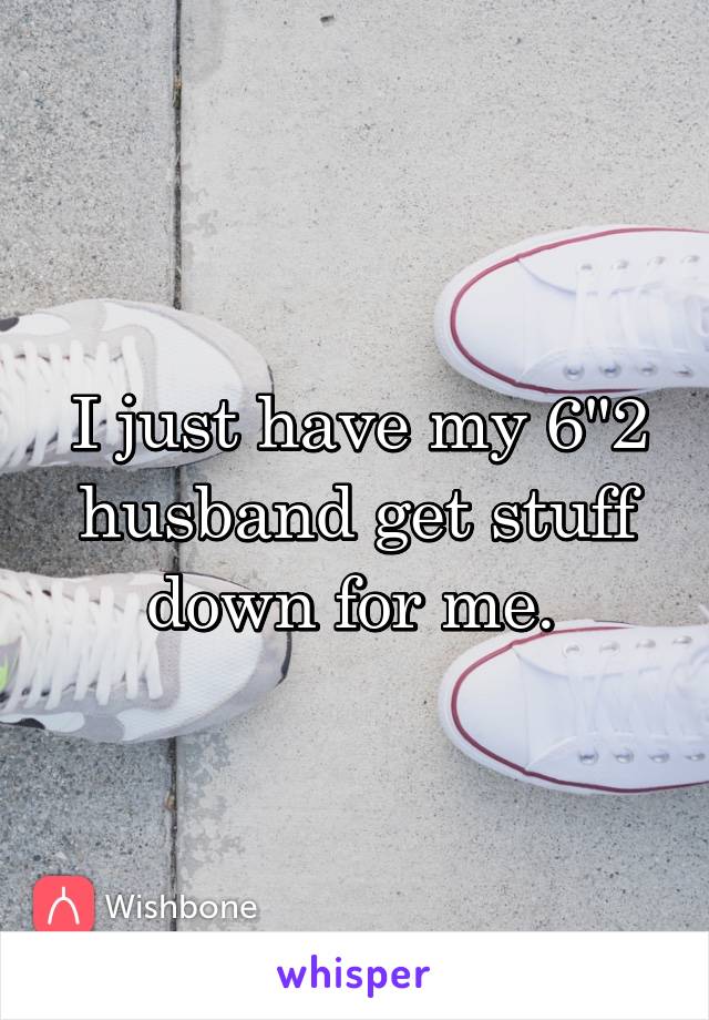 I just have my 6"2 husband get stuff down for me. 