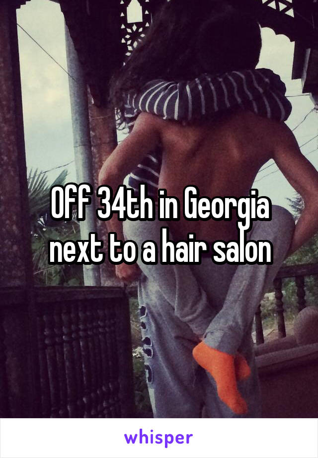 Off 34th in Georgia next to a hair salon