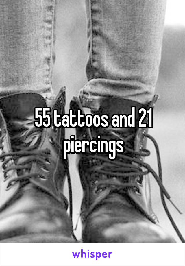 55 tattoos and 21 piercings