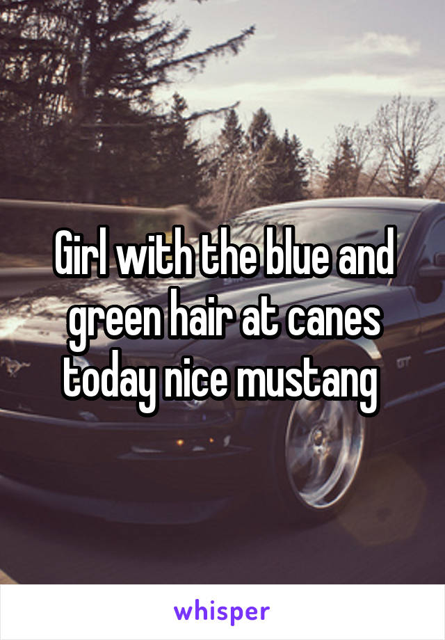 Girl with the blue and green hair at canes today nice mustang 