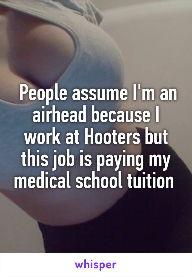  People assume I'm an airhead because I work at Hooters but this job is paying my medical school tuition 