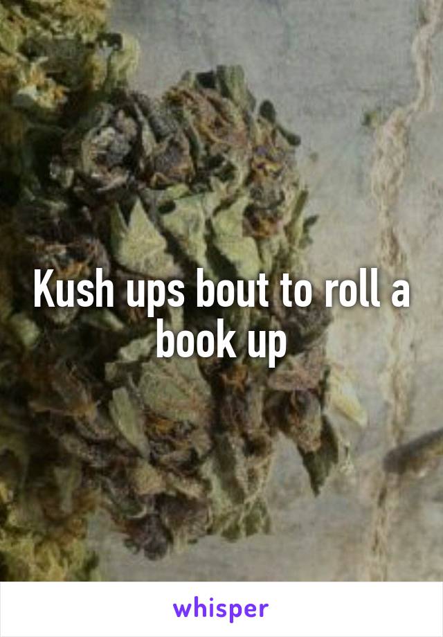 Kush ups bout to roll a book up