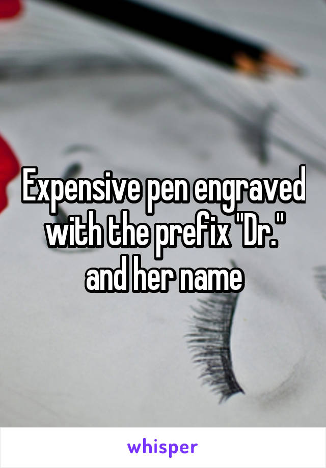 Expensive pen engraved with the prefix "Dr." and her name