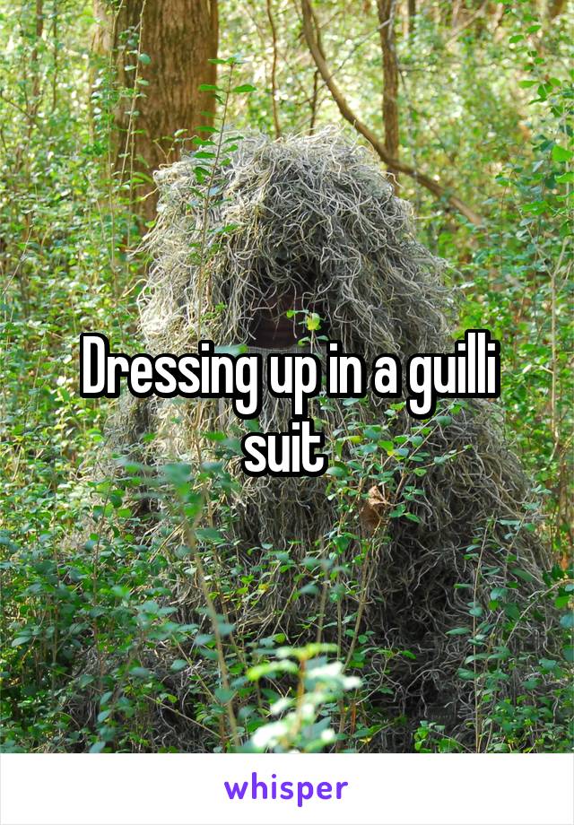 Dressing up in a guilli suit 