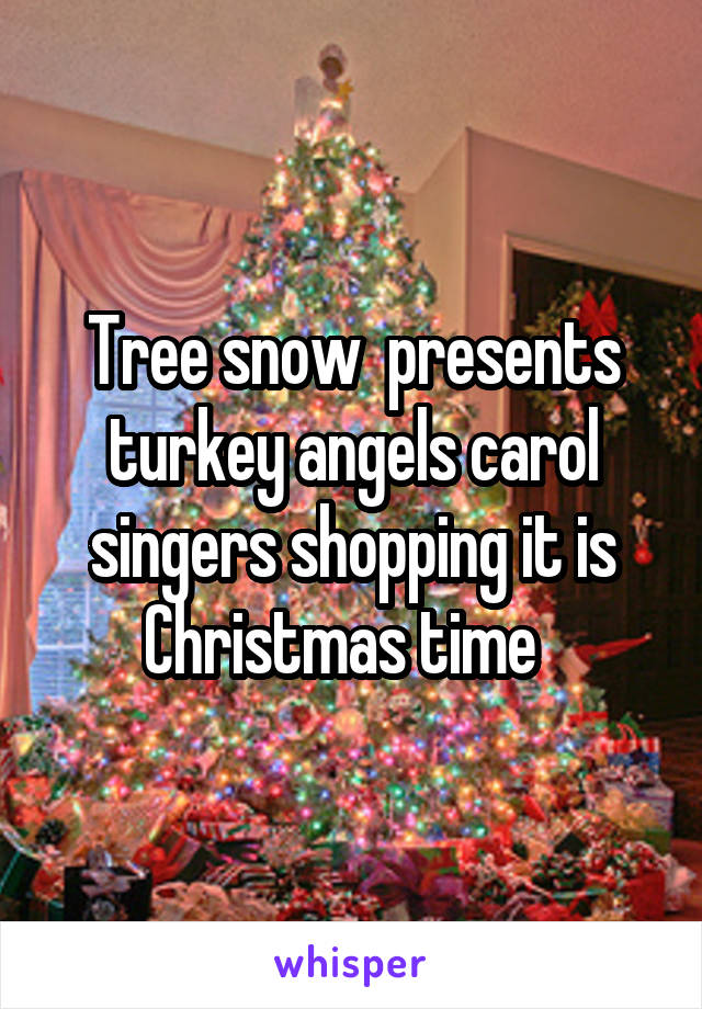 Tree snow  presents turkey angels carol singers shopping it is Christmas time  