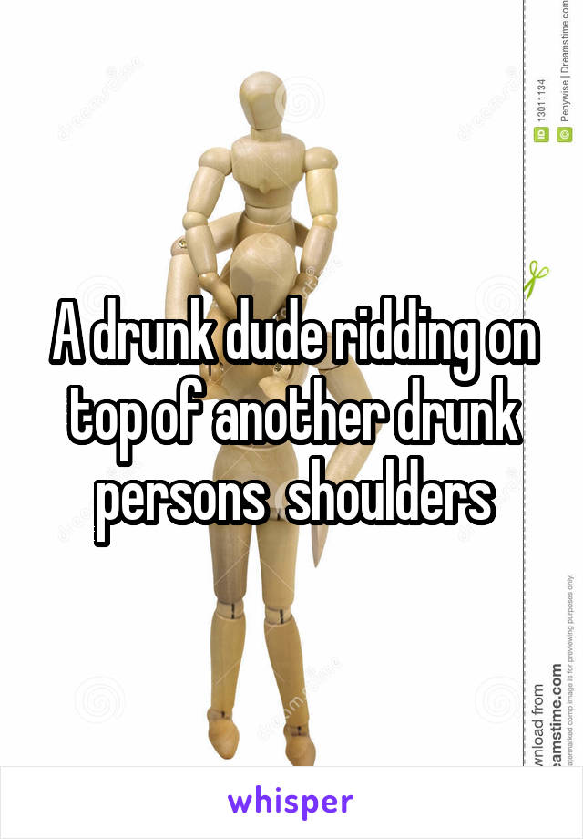 A drunk dude ridding on top of another drunk persons  shoulders
