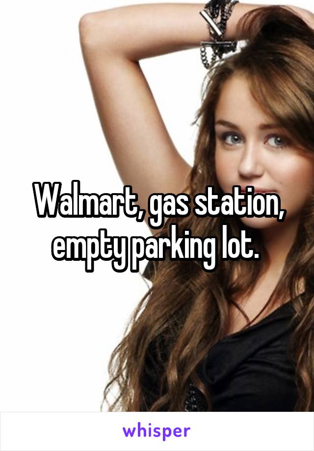 Walmart, gas station, empty parking lot. 