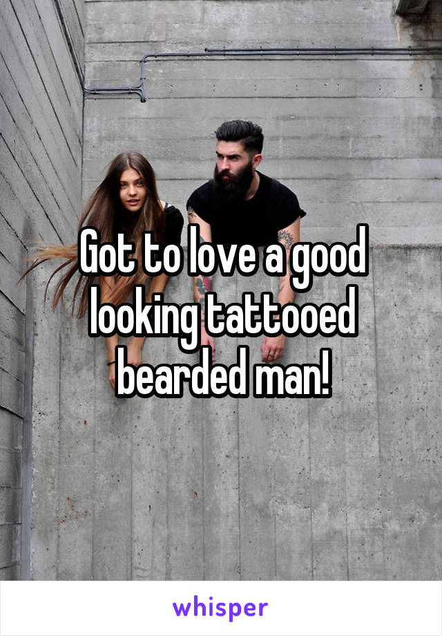 Got to love a good looking tattooed bearded man!