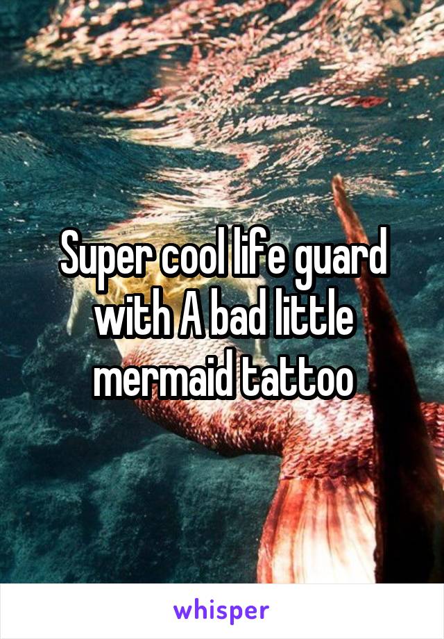 Super cool life guard with A bad little mermaid tattoo
