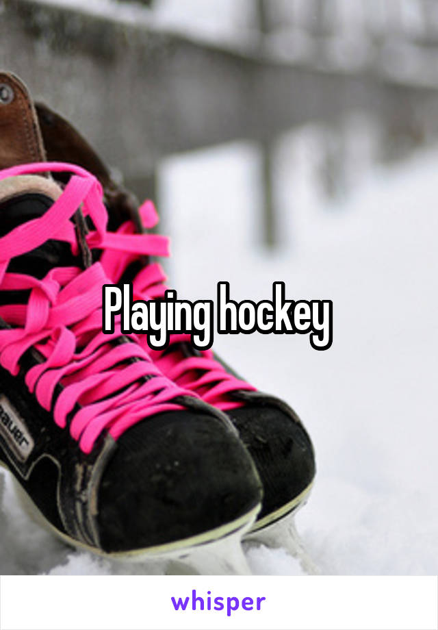 Playing hockey 