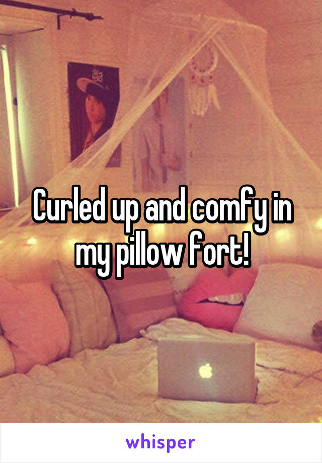 Curled up and comfy in my pillow fort!