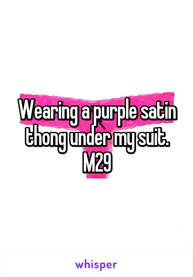 Wearing a purple satin thong under my suit. M29