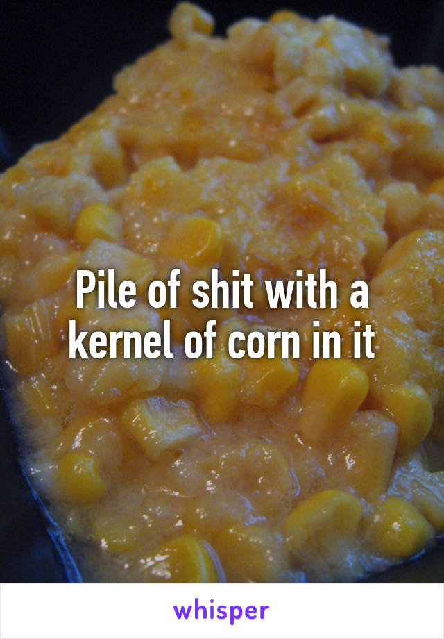 Pile of shit with a kernel of corn in it