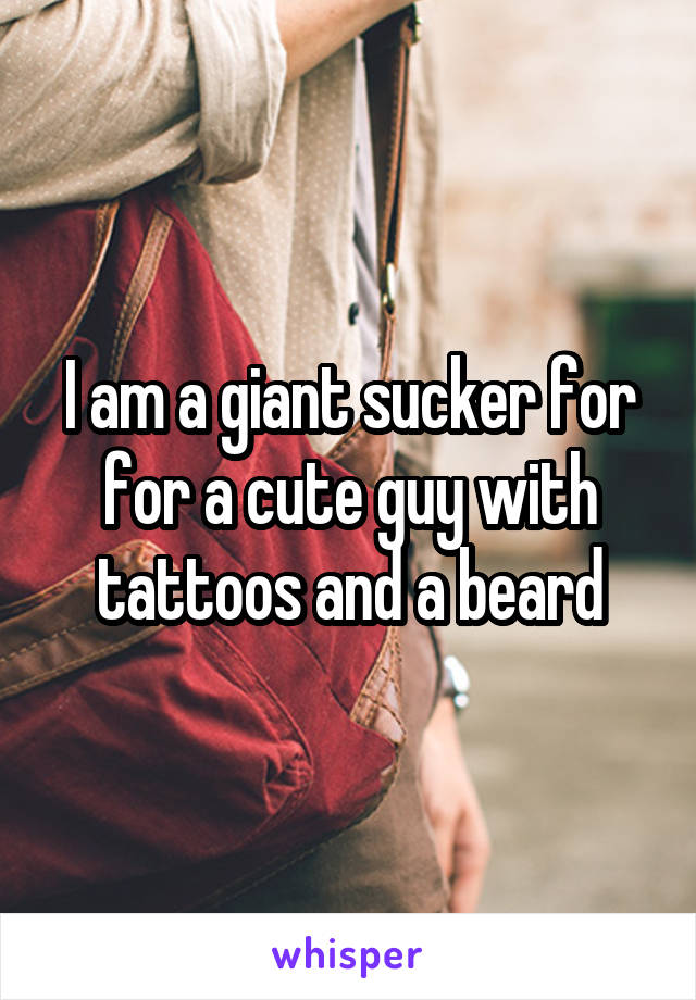 I am a giant sucker for for a cute guy with tattoos and a beard