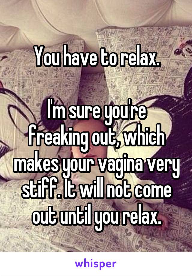 You have to relax.

I'm sure you're freaking out, which makes your vagina very stiff. It will not come out until you relax.