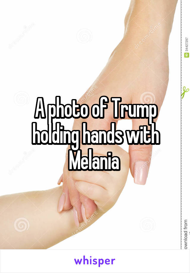 A photo of Trump holding hands with Melania 