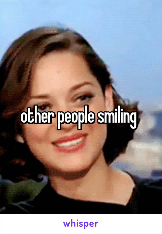 other people smiling  