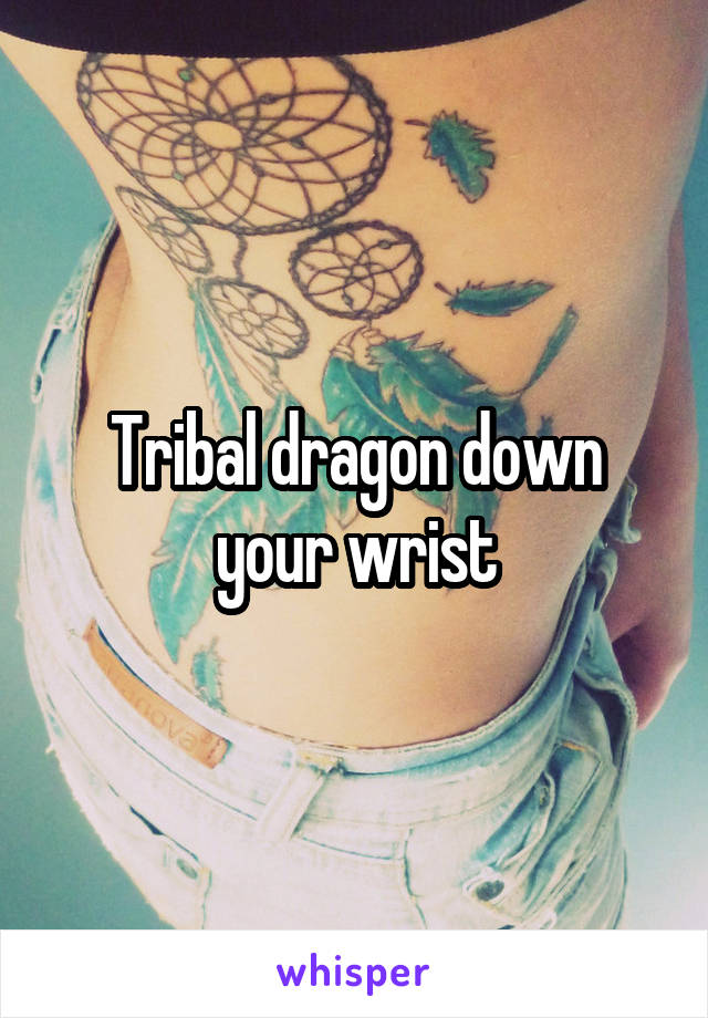 Tribal dragon down your wrist