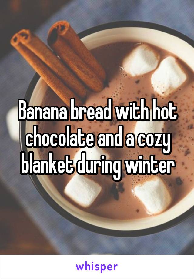 Banana bread with hot chocolate and a cozy blanket during winter