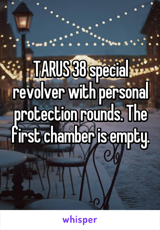 TARUS 38 special revolver with personal protection rounds. The first chamber is empty. 