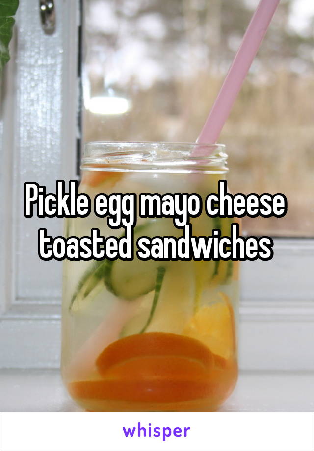 Pickle egg mayo cheese  toasted sandwiches 