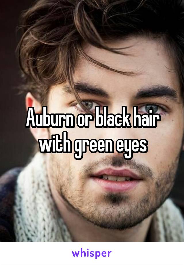 Auburn or black hair with green eyes