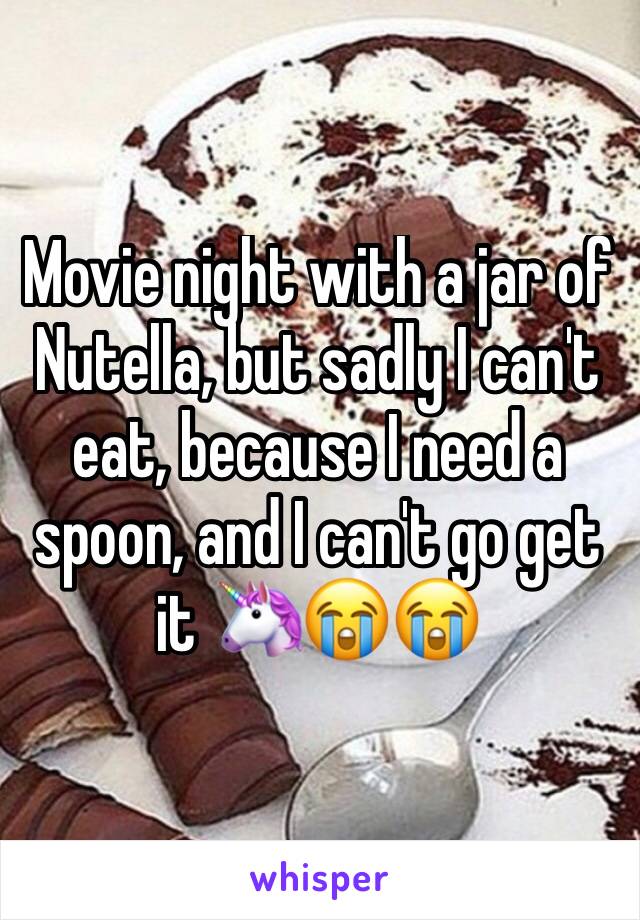 Movie night with a jar of Nutella, but sadly I can't eat, because I need a spoon, and I can't go get it 🦄😭😭