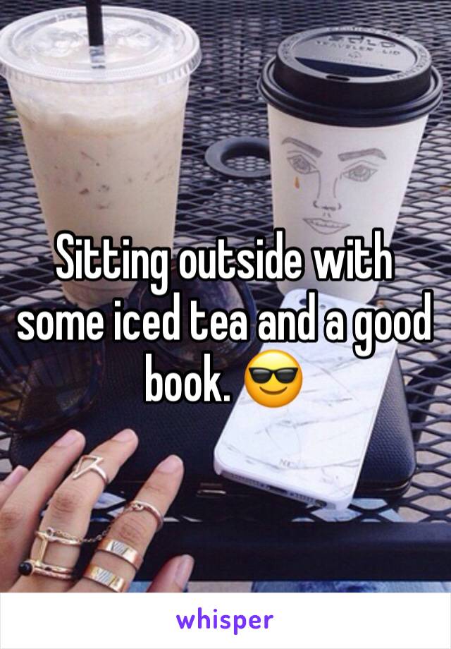 Sitting outside with some iced tea and a good book. 😎