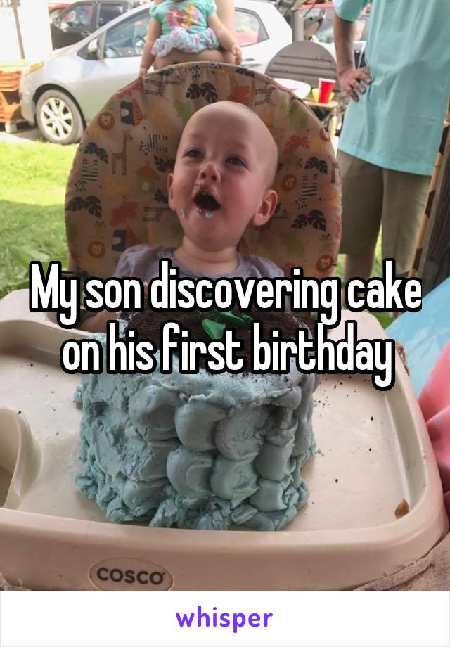 My son discovering cake on his first birthday