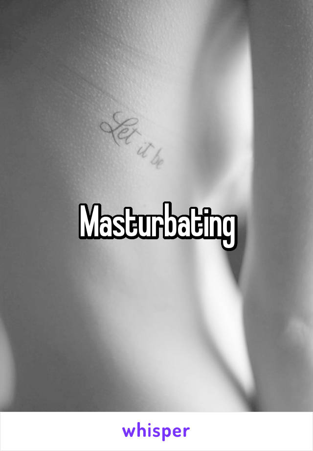 Masturbating