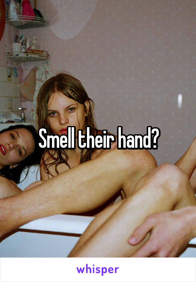 Smell their hand?