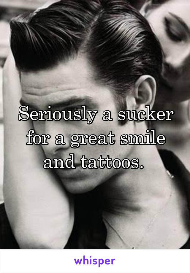 Seriously a sucker for a great smile and tattoos. 