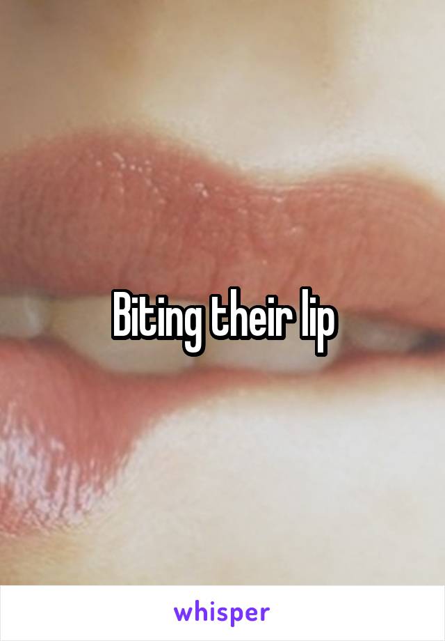 Biting their lip