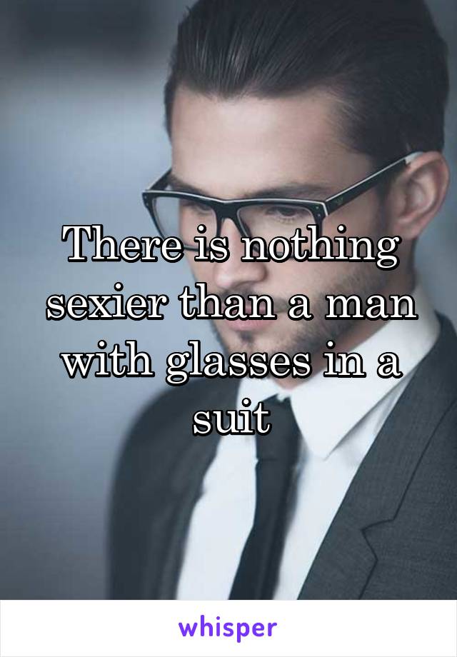 There is nothing sexier than a man with glasses in a suit