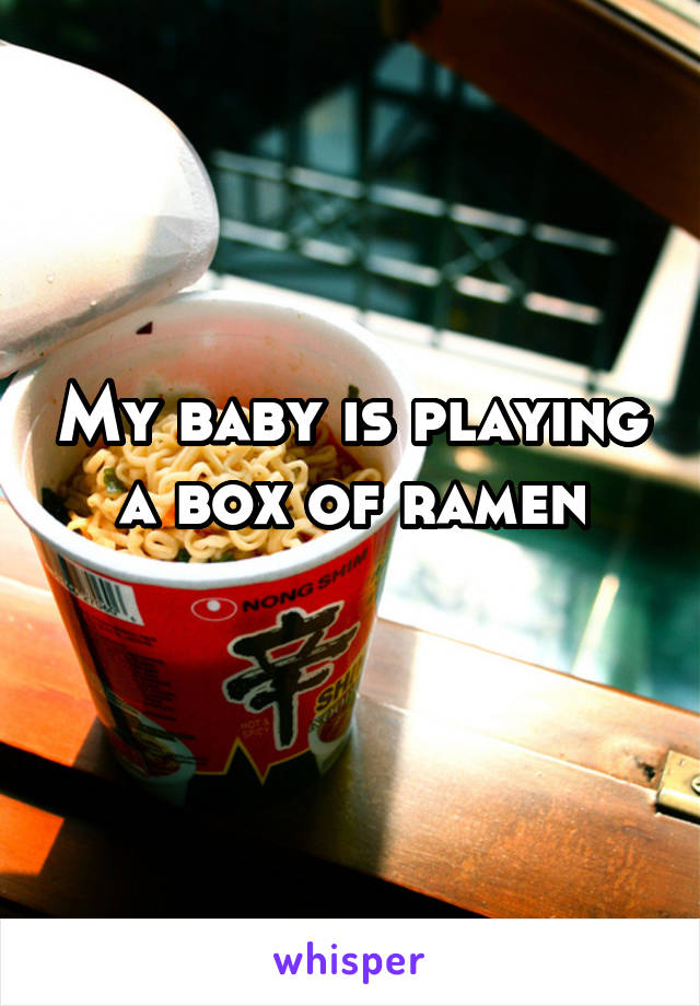 My baby is playing a box of ramen
