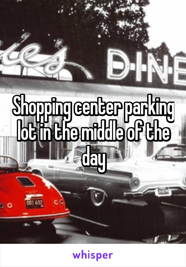 Shopping center parking lot in the middle of the day