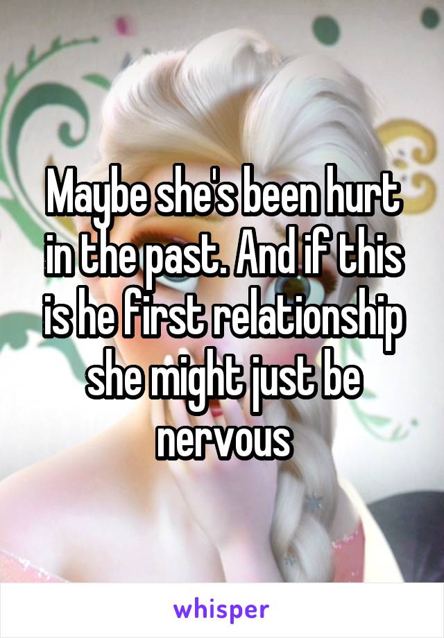 Maybe she's been hurt in the past. And if this is he first relationship she might just be nervous